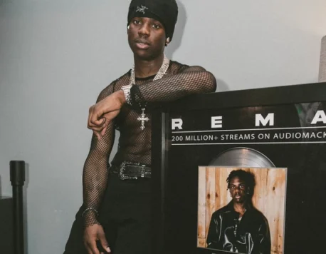 Rema gets plaque from Audiomack for surpassing 200 million streams