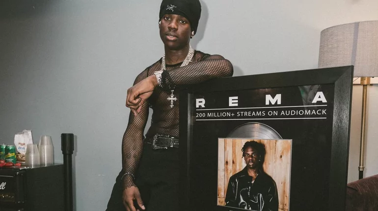 Rema gets plaque from Audiomack for surpassing 200 million streams